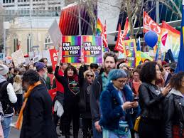 Protestors in Melbourne, Australia show support for marriage equality at a rally.