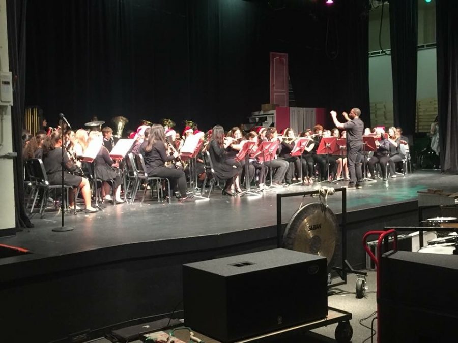 Concert band performs an array of holiday-themed songs at the winter concert on Dec. 13.