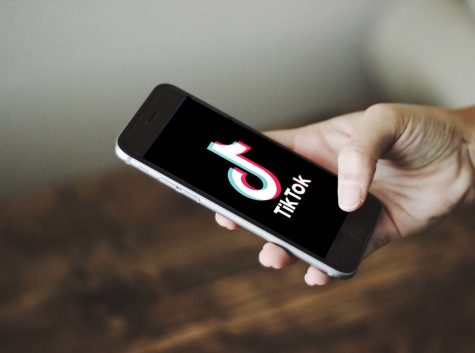 TikTok on iPhone by Nordskov Media is marked with CC0 1.0.